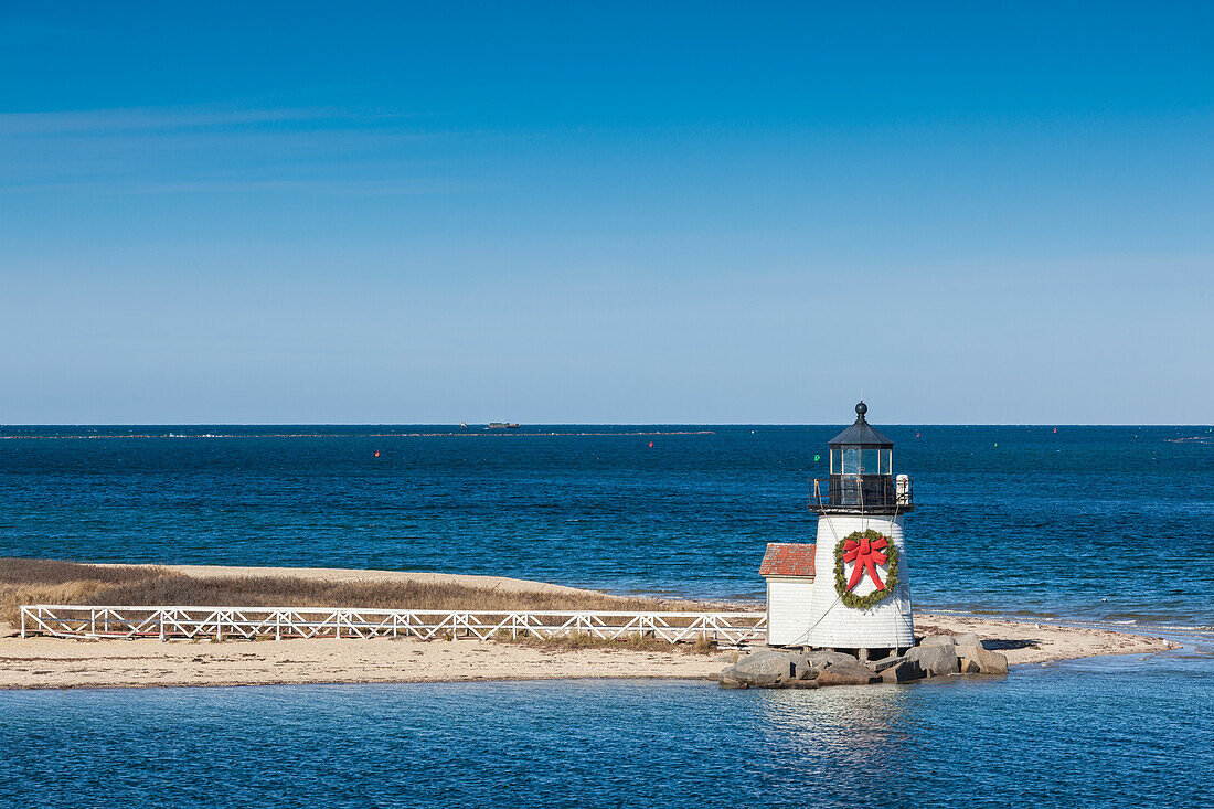 USA, Massachusetts, Nantucket Island. Nantucket Town, Brant Point Lighthouse from Nantucket Ferry.