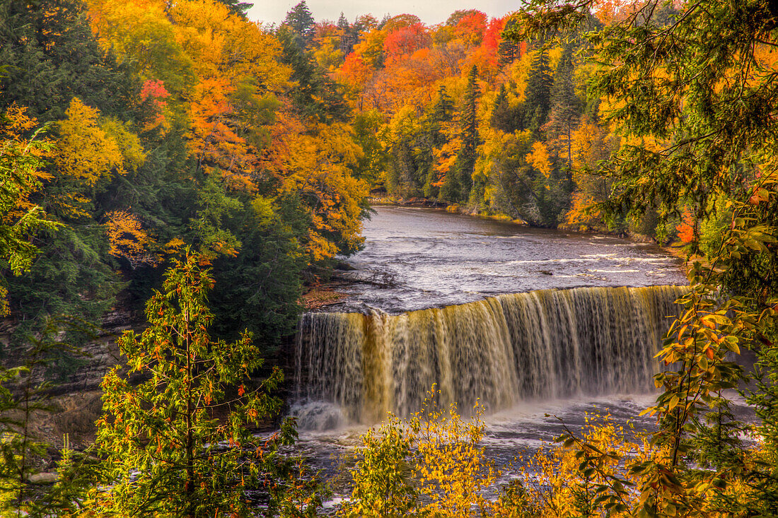 North America, USA, Upper Peninsula of Michigan, Paradise, Tahquamenon Falls State Park, Upper Falls with Fall Colors.
