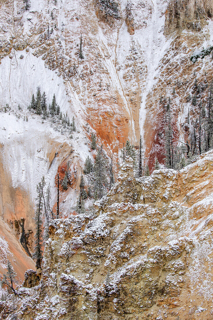 Snow mixed with colors of Grand Canyon of Yellowstone, Yellowstone National Park, Montana.