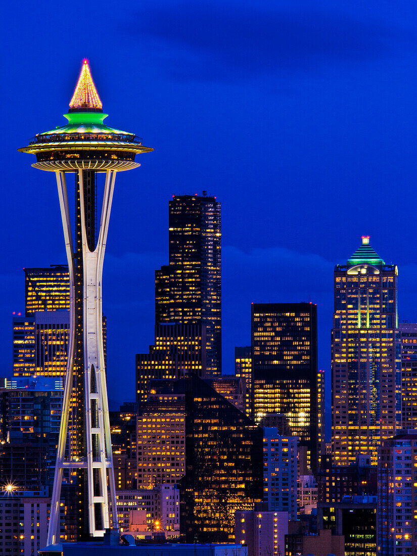 USA, Washington State, Seattle, Night View of Seattle Skyline with Christmas Tree on the Space Needle