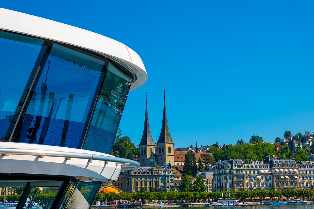 Modern Cabin on a Passenger Ship and Cityscape of Lucerne in a Sunny Summer Day in Switzerland.