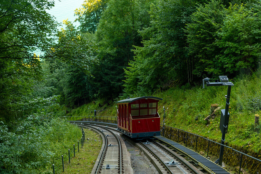 Cable Car on Mountain Side in a Sunny Day in Burgenstock, Nidwalden in Switzerland.