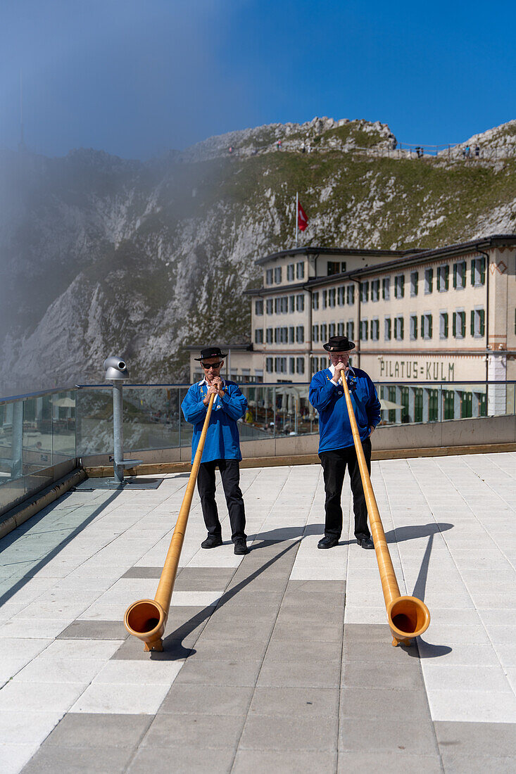 Alphorn players at the Pilatus-Kulm mountain station