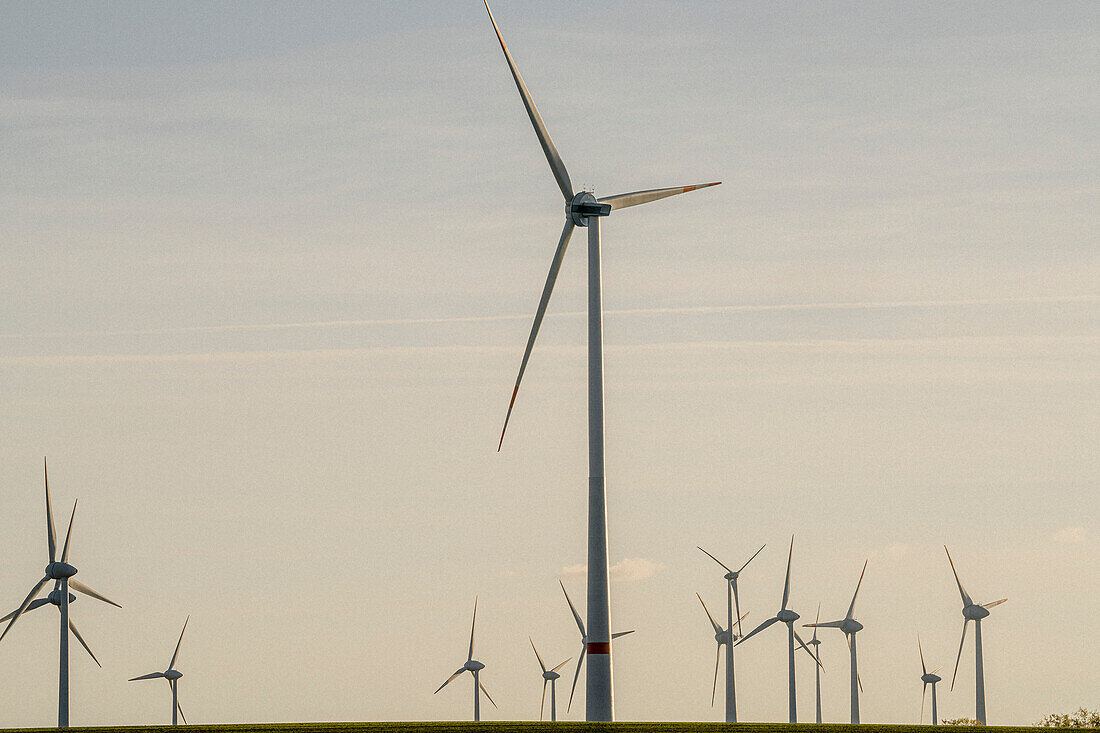 Wind turbines against blue sunset sky, Germany