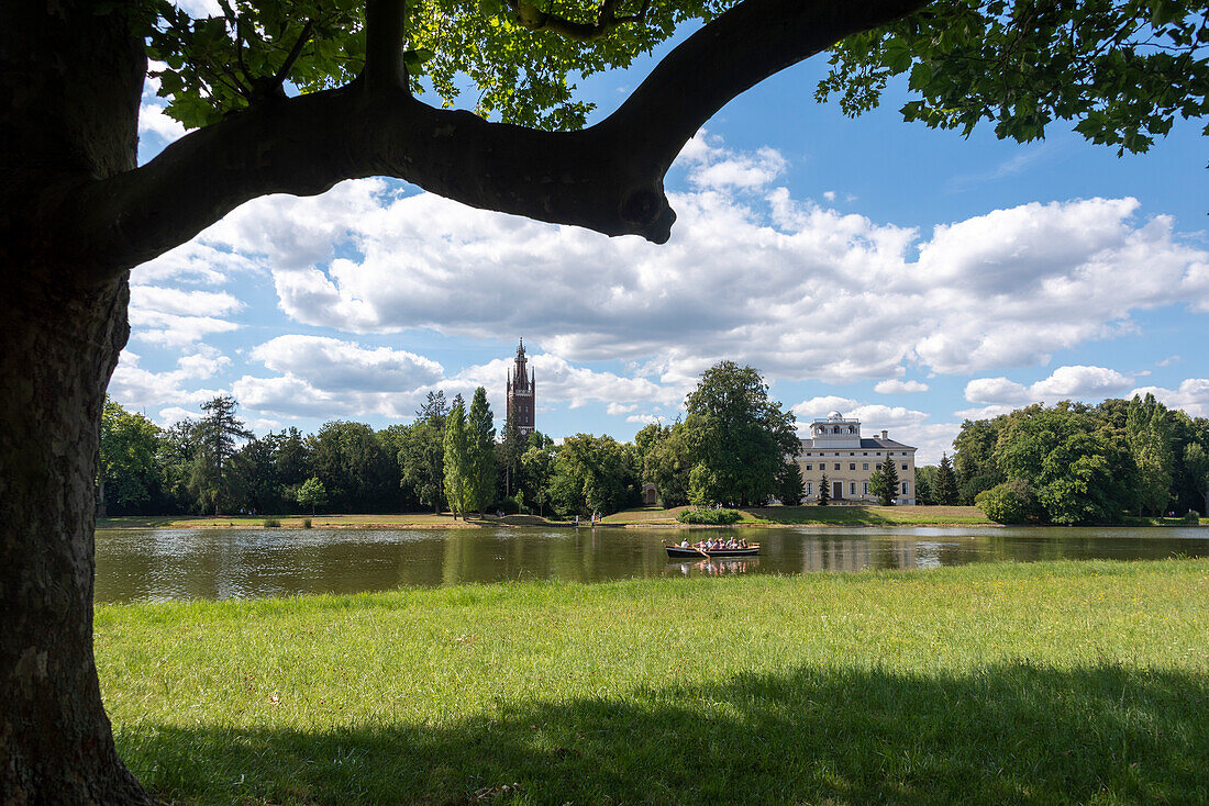 Gondola ride on the canal, Bible Tower, Wörlitz Castle, Garden Kingdom of Dessau-Wörlitz, Wörlitz Park, Unesco World Heritage Site, Wörlitz, Saxony-Anhalt, Germany