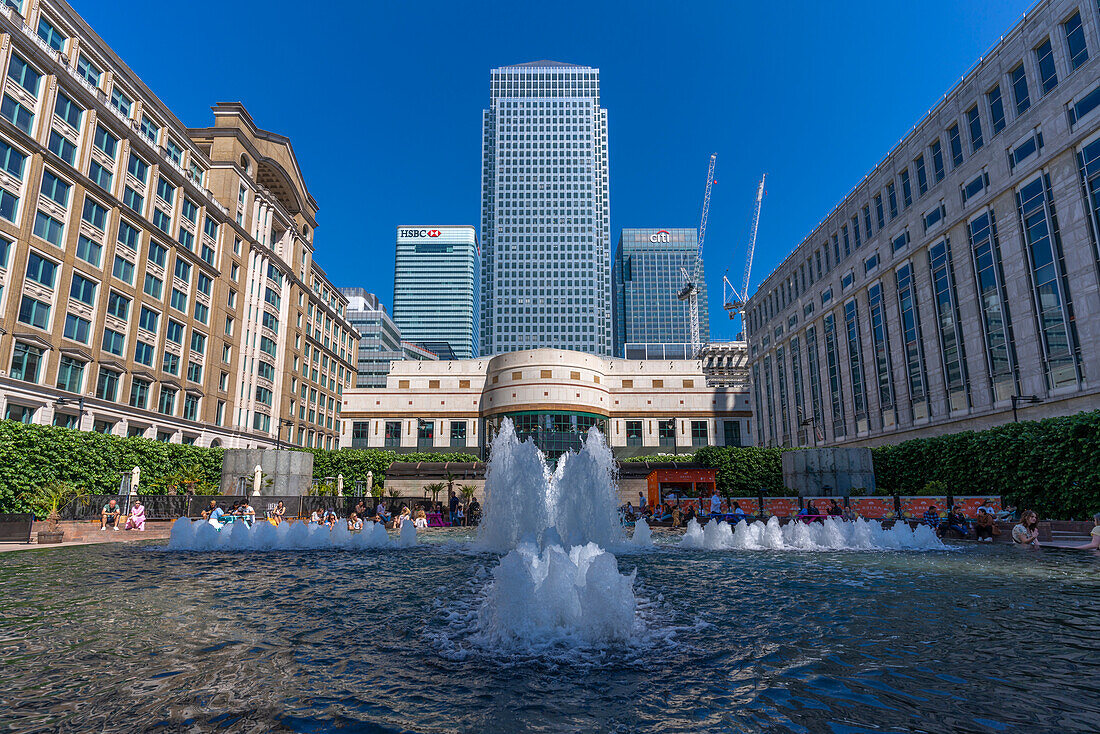 View of Canary Wharf tall buildings and fountains, Docklands, London, England, United Kingdom, Europe