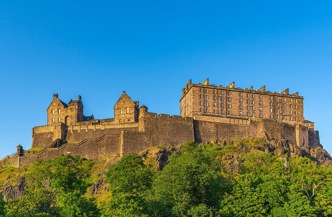 View of Edinburgh Castle from Princes Street at sunset, UNESCO World Heritage Site, Edinburgh, Scotland, United Kingdom, Europe