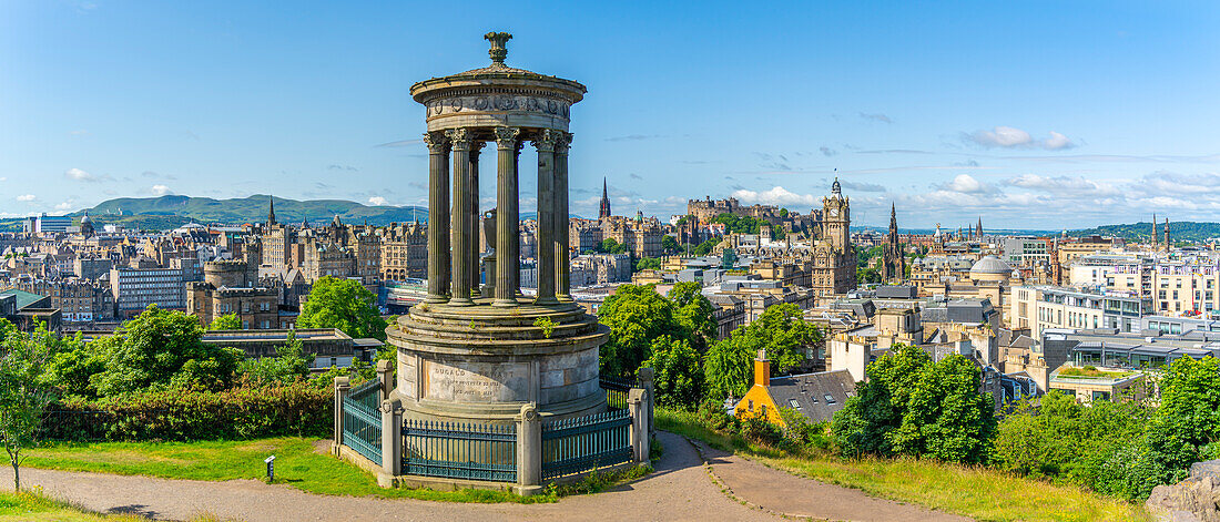 View of city centre skyline and Dugald Stewart Monument, Edinburgh, Scotland, United Kingdom, Europe