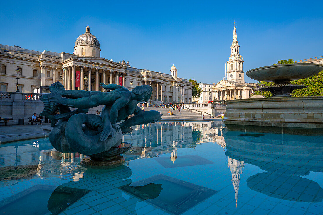 View of The National Gallery and fountains in Trafalgar Square, Westminster, London, England, United Kingdom, Europe