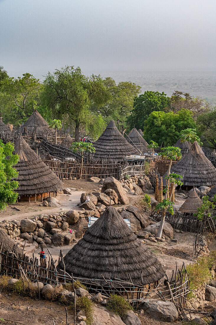 Tradtional huts of the Otuho (Lotuko) tribe in a village in the Imatong mountains, Eastern Equatoria, South Sudan, Africa