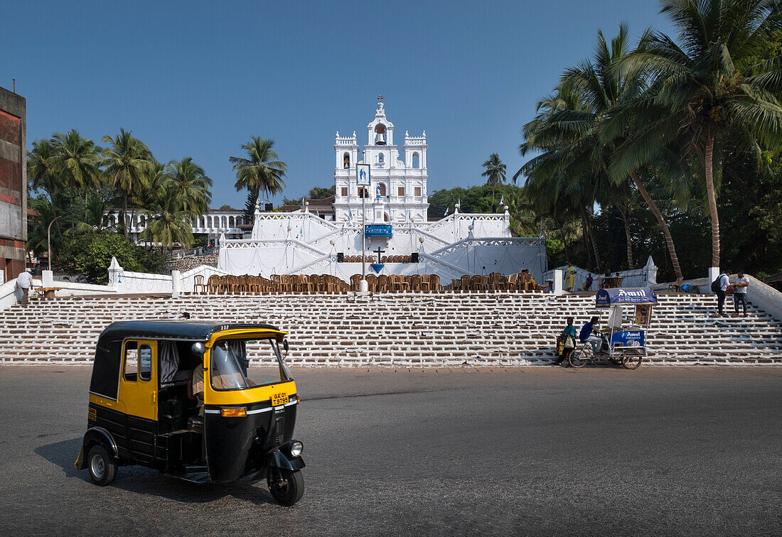 Tuk Tuk passing The Church of Our Lady of the Immaculate Conception, UNESCO World Heritage Site, Panjim City (Panaji), Goa, India, Asia