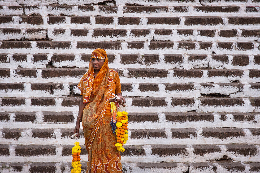 Indian Woman selling Malas (flower garlands), Panjim City (Panaji), Goa, India, Asia