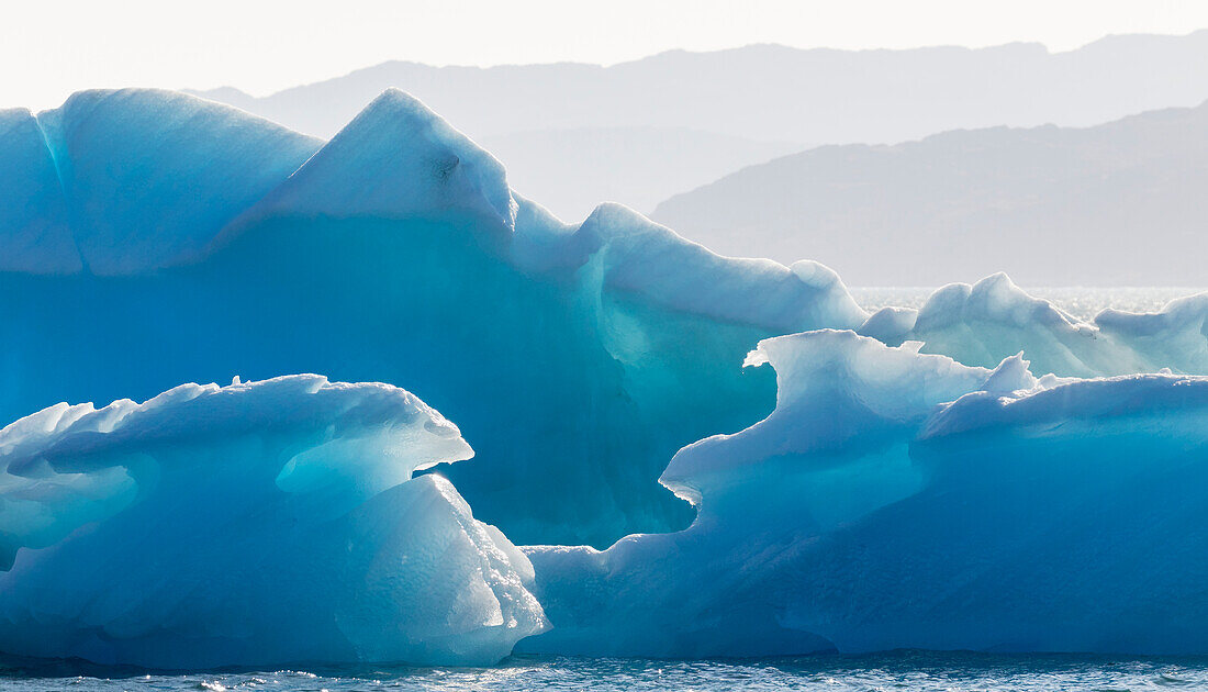 Icebergs drifting in the fjords of southern Greenland, Denmark