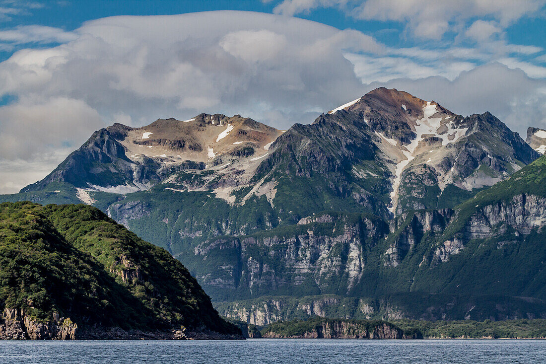 USA, Alaska, Katmai National Park. Scenic landscape in Amalik Bay illustrating snow fields and tan volcanic ash fields.