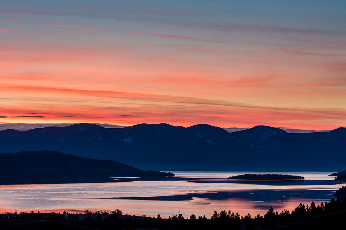 Sunrise color over Flathead Lake in Elmo, Montana, USA