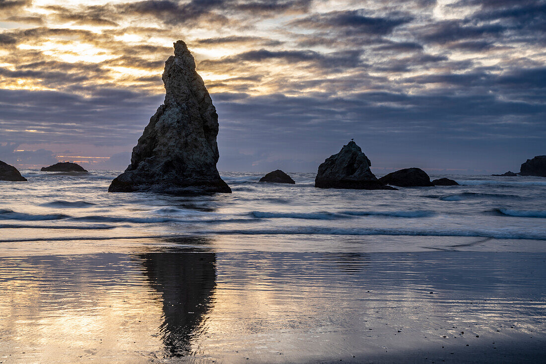 USA, Oregon, Bandon Beach. Pacific Ocean sea stacks at sunset.