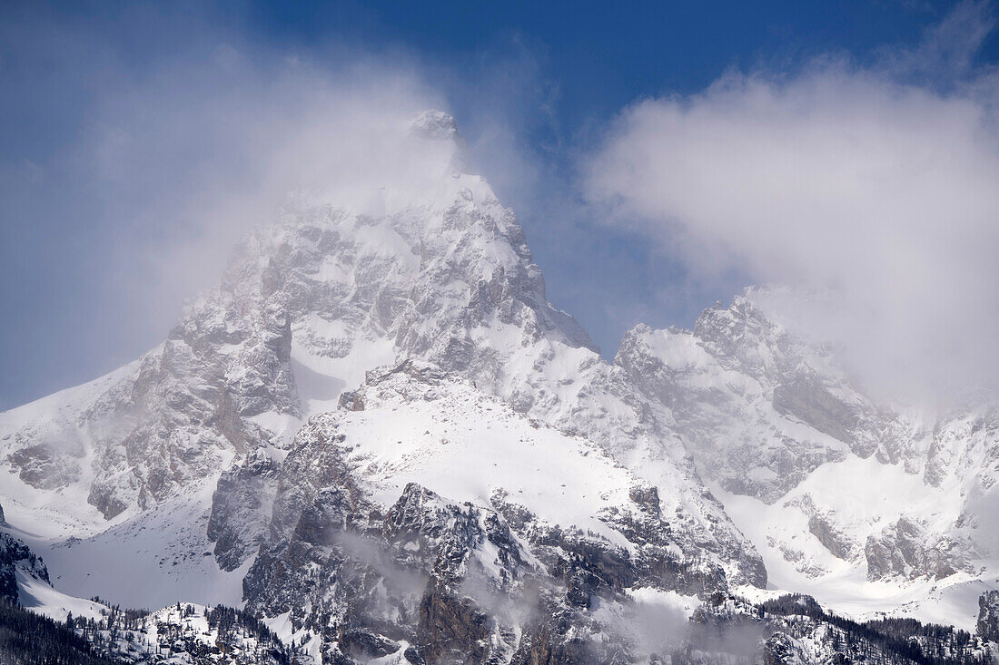 USA, Wyoming, Grand Teton National Park. Clouds over mountains during spring snowstorm.