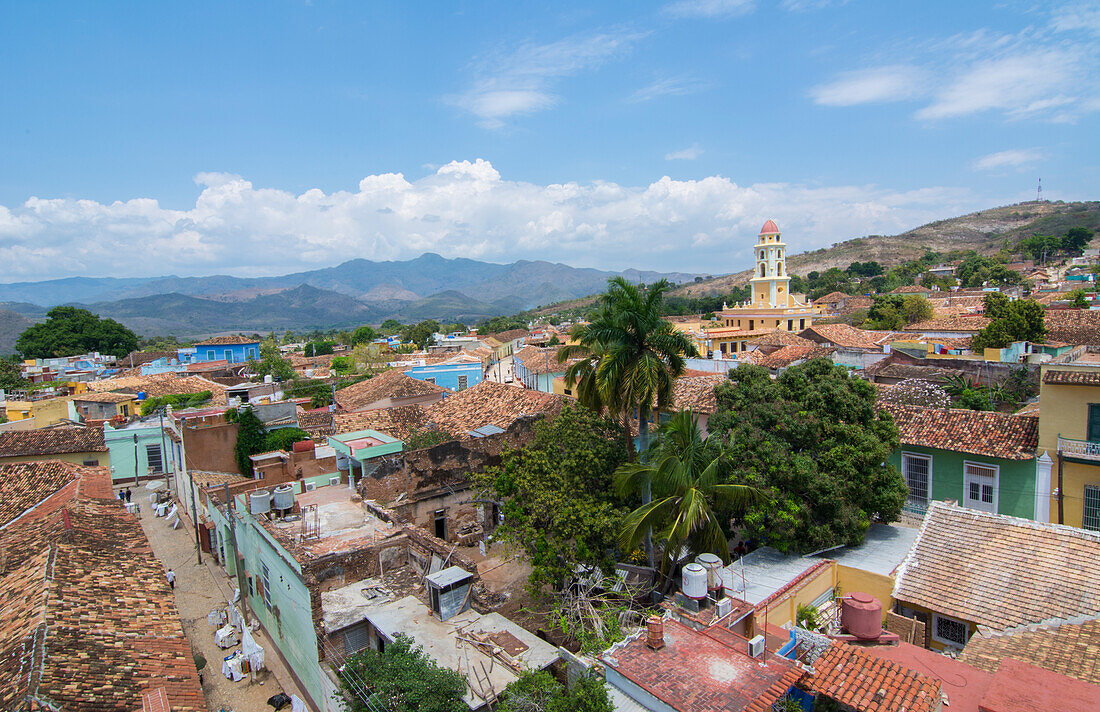 Trinidad Cuba from above tower with church and mountains with buildings of tile roofs of second oldest Colonial city