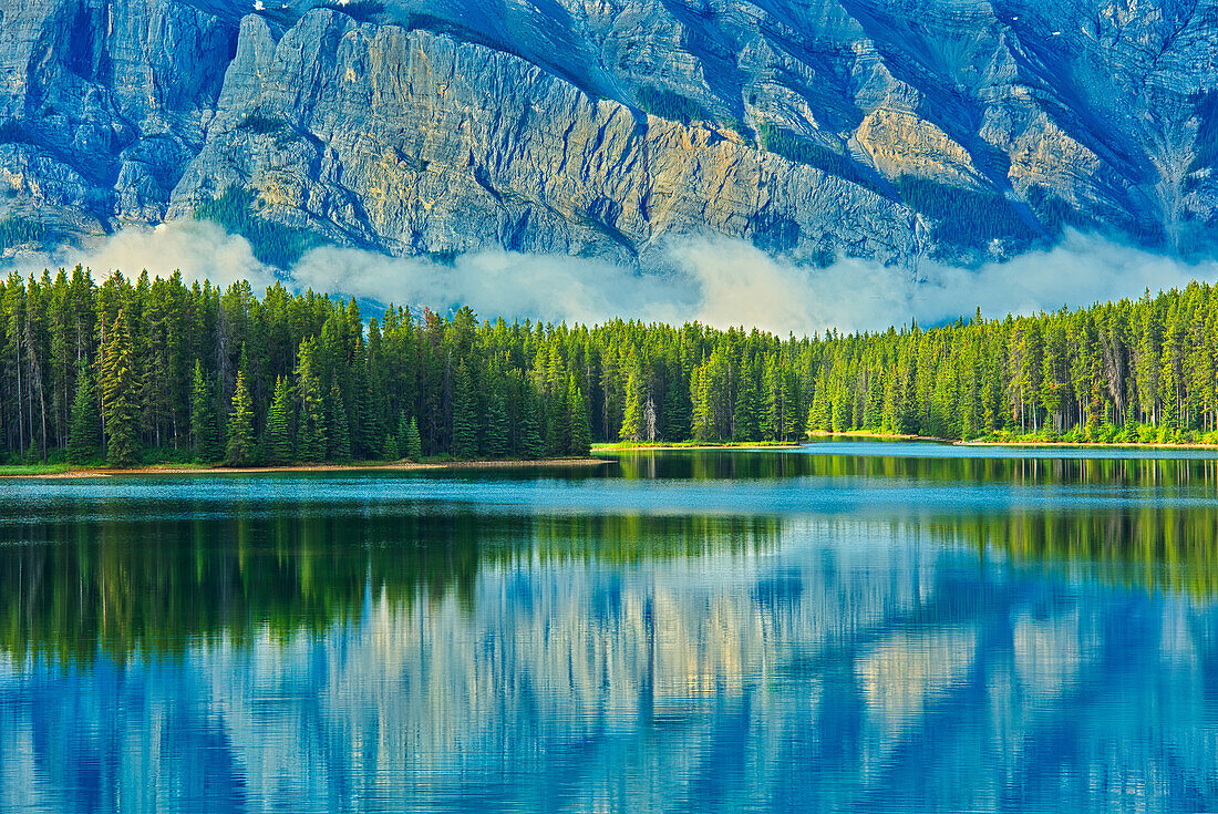 Canada, Alberta, Banff National Park. Reflection of Mt. Rundle in Two Jack Lake.