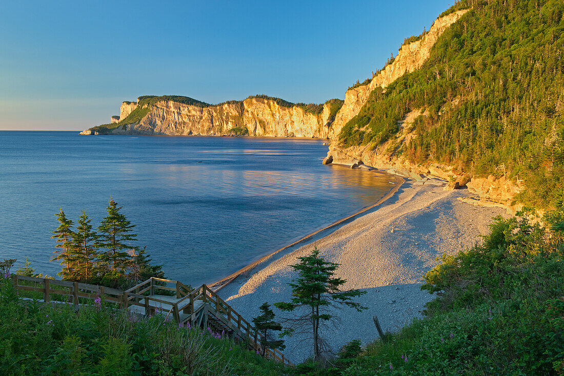 Canada, Quebec, Forillon National Park. Limestone cliffs along bay.