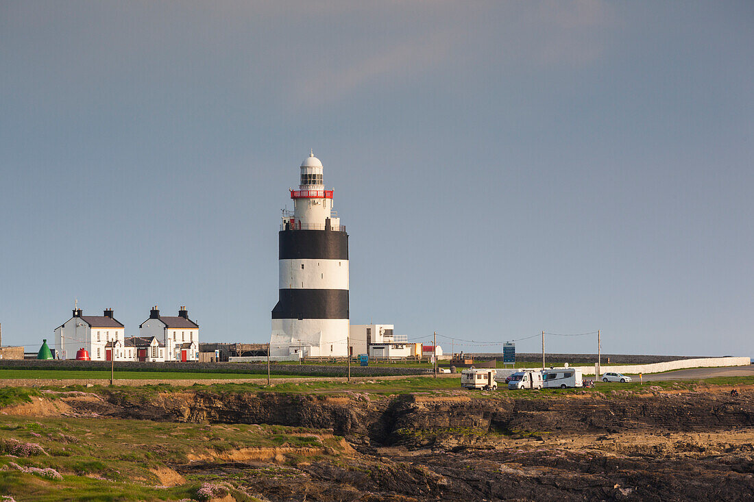 Ireland, County Wexford, Hook Peninsula, Hook Head, Hook Head LIghthouse, sunset