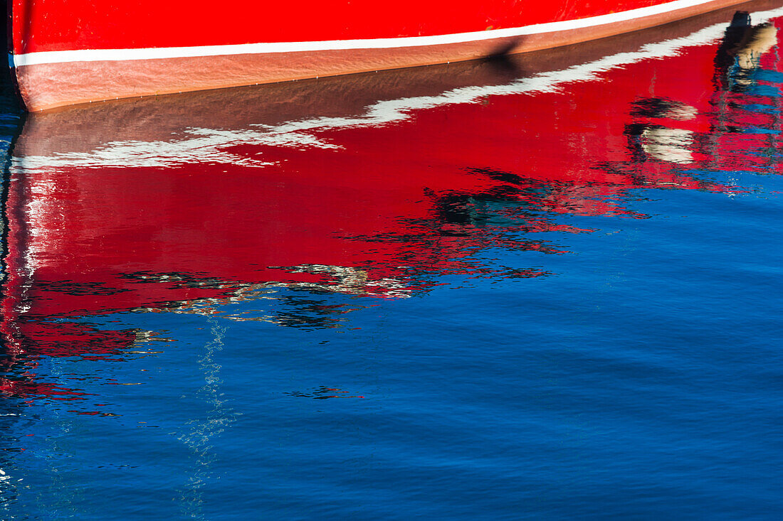 Ireland, County Fingal, Howth, Howth Harbor, boat reflections