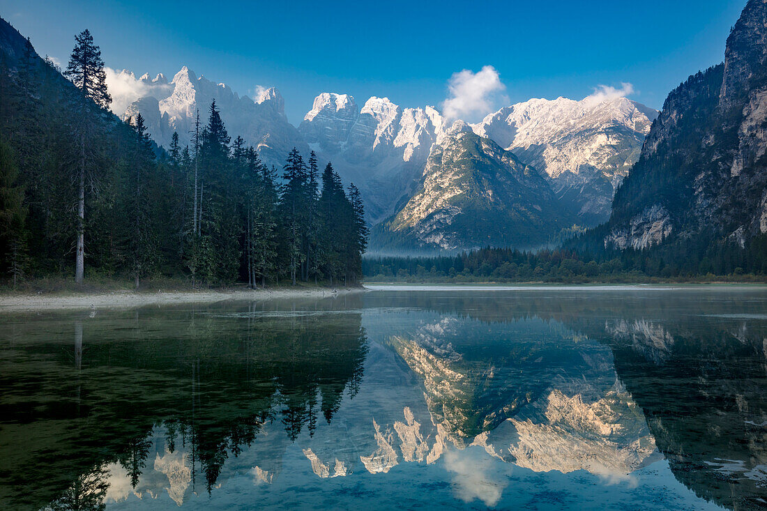 Monte Cristallo and the Dolomite Mountains reflected in Lago di Landro, Belluno Province, Italy