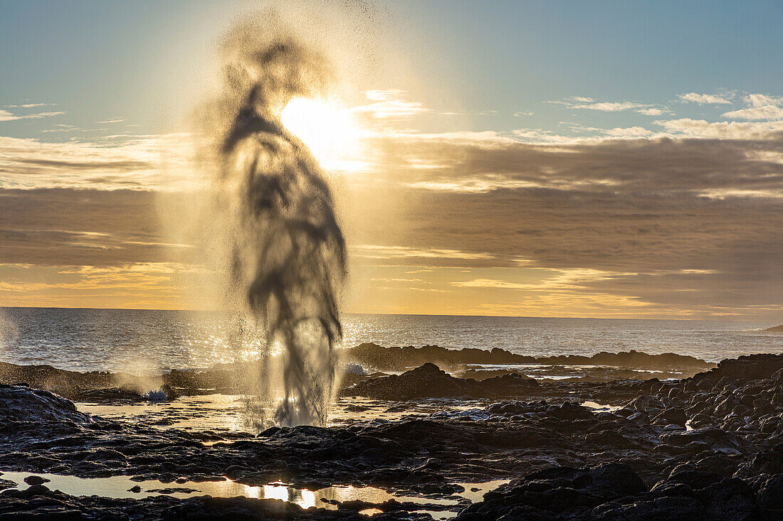 The Spouting Horn at sunset near Poipu in Kauai, Hawaii, USA