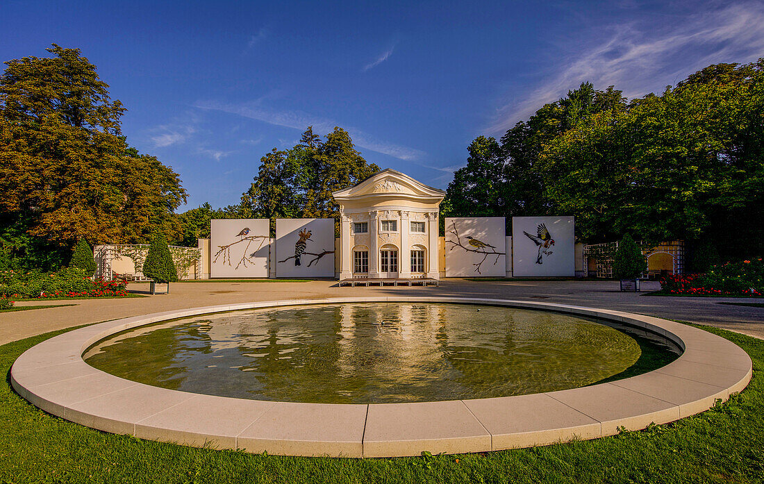 Orangery and fountain in the Rosarium of Doblhoffpark in the morning light, Baden near Vienna, Lower Austria; Austria