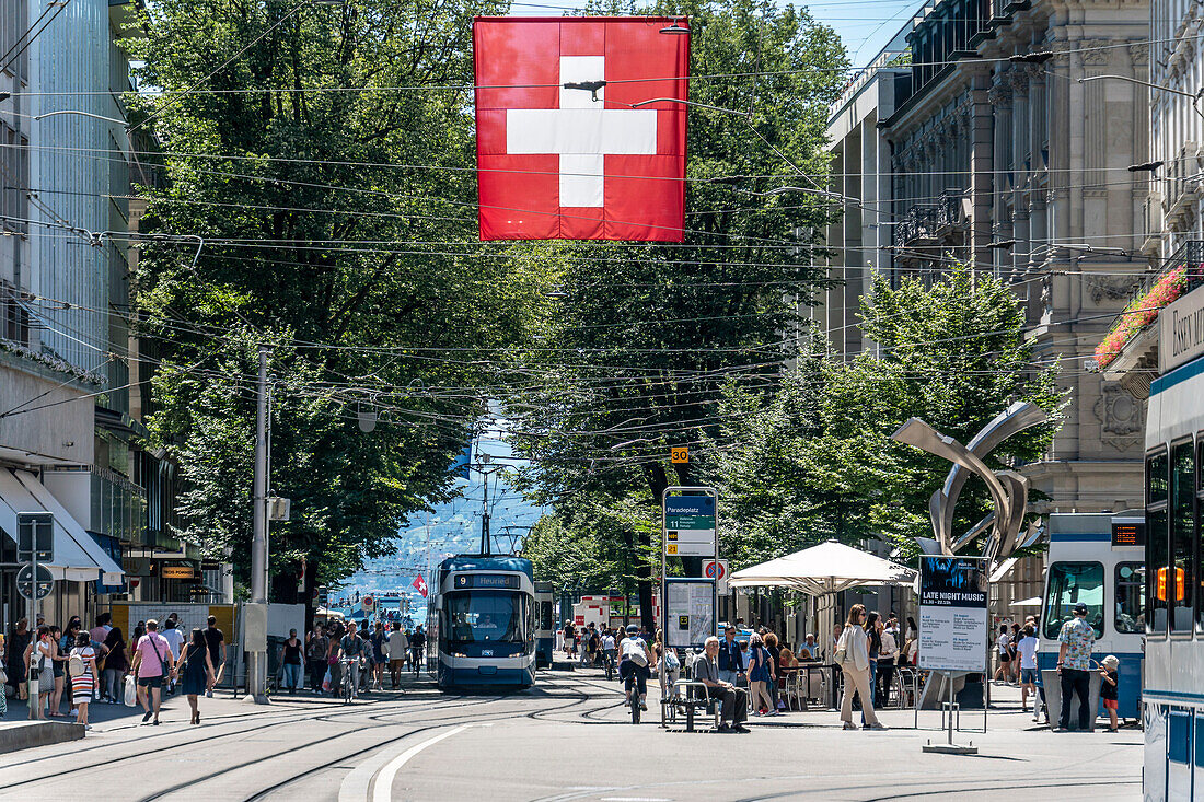 Paradeplatz Zurich, Bahnhofstrasse, Swiss flag, trams, Switzerland