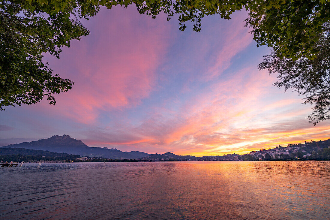 View over Lake Lucerne to Lucerne with red sky