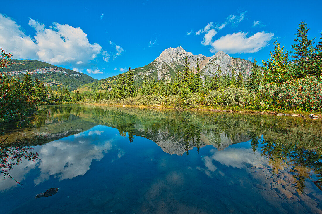 Canada, Alberta, Kananaskis Country. Mount Lorette reflects in Lorette Ponds