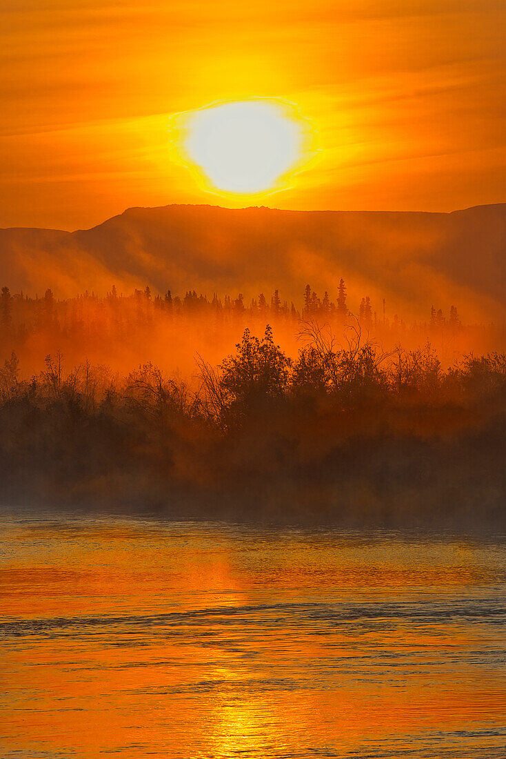Canada, Yukon, Kluane National Park. Fog on Dezadeash River at sunrise