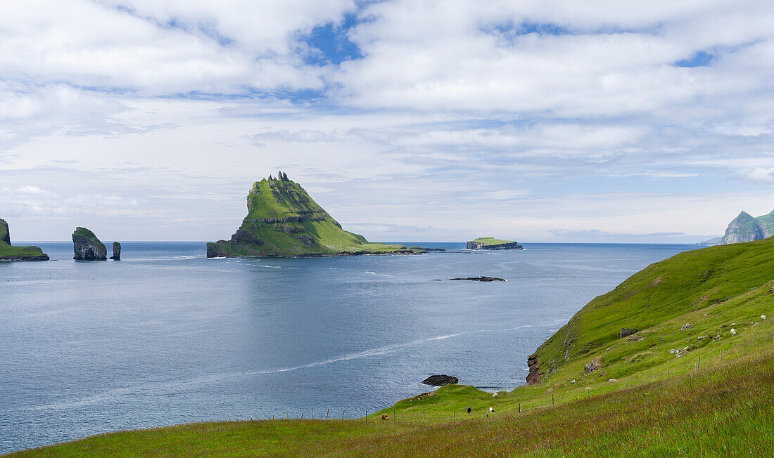 Tindholmur In Sorvagsfjordur. Island Vagar, Part Of The Faroe Islands In The North Atlantic. Denmark