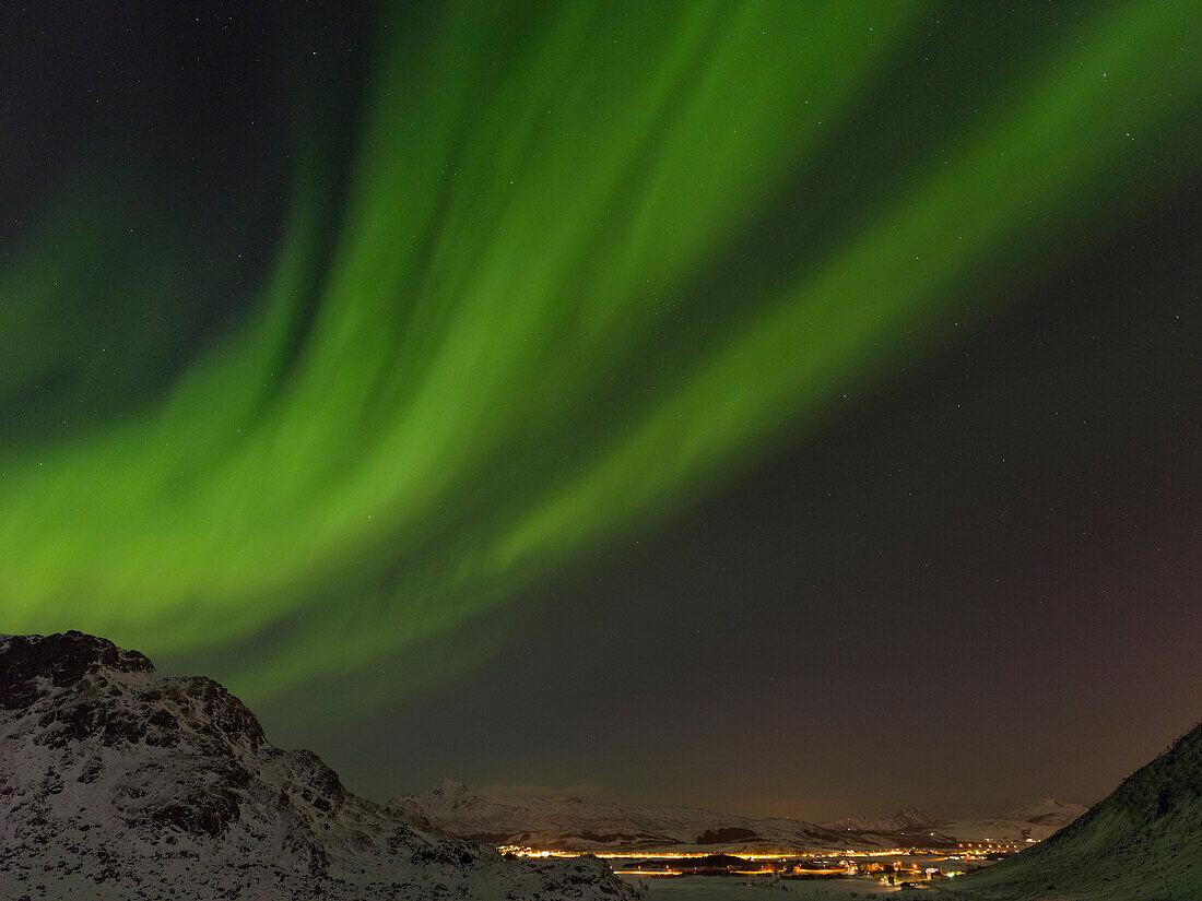 Northern Lights near Leknes, island Vestvagoy. The Lofoten islands in northern Norway during winter. Scandinavia, Norway