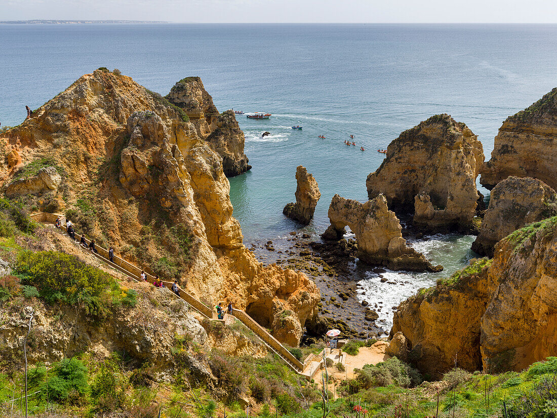 The cliffs and sea stacks of Ponta da Piedade at the rocky coast of the Algarve in Portugal.