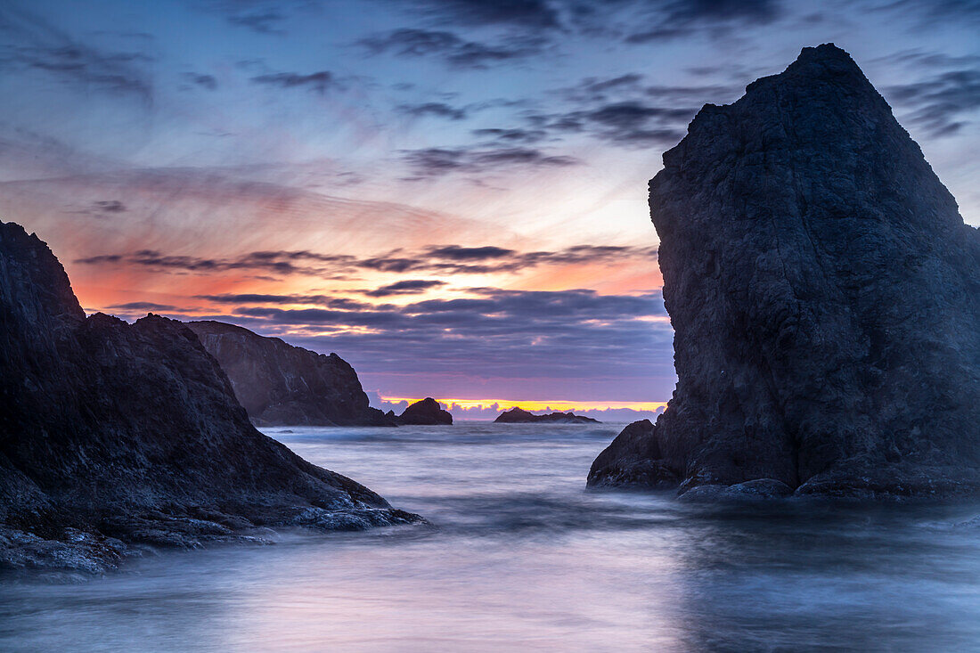 USA, Oregon, Bandon Beach. Pacific Ocean sea stacks at sunset.