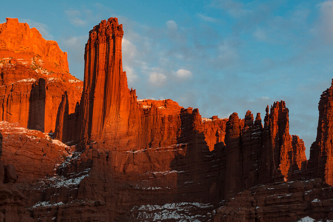 USA, Utah. Fisher Towers with snow and clouds, near Castle Valley