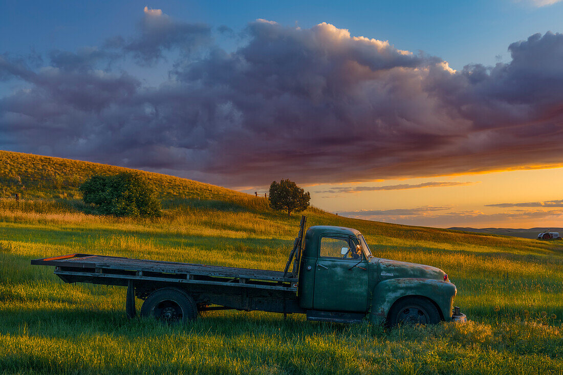 Abandoned truck on hillside at sunset, Palouse region of eastern Washington.