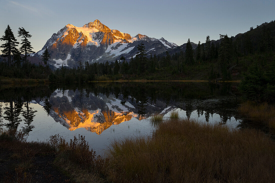 USA, Washington State. Glaciated Mt. Shuksan reflected in Picture Lake, Mt. Baker-Snoqualmie National Forest .