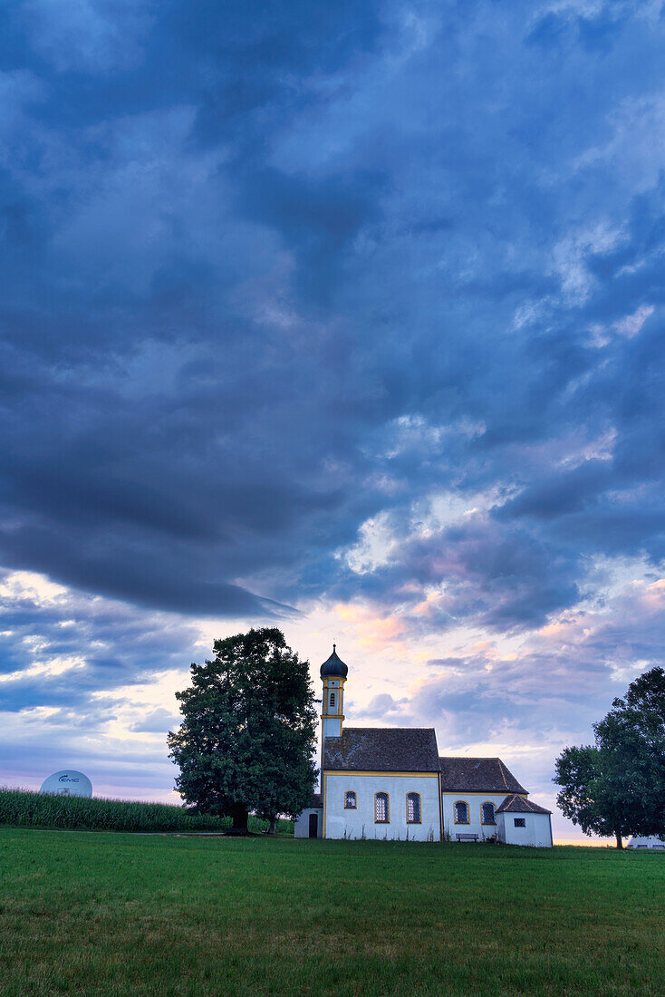Storm clouds over St. John the Baptist on a summer evening, Raisting, Weilheim, Bavaria, Germany, Europe