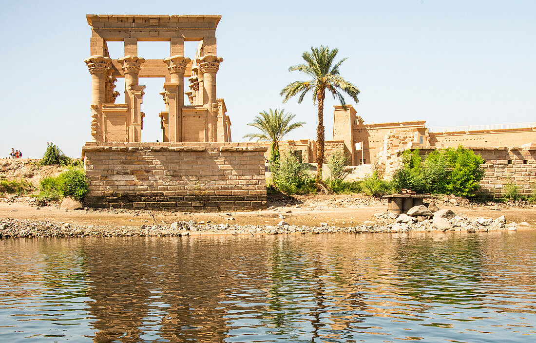 Upper Egypt, Aswan between the two dams, Philae Temple of Isis, Trajan's Kiosk, aka The Hypaethral Temple, columns with elaborate capitals, seen from the Nile, Ptolemaic Period on Nubian border.