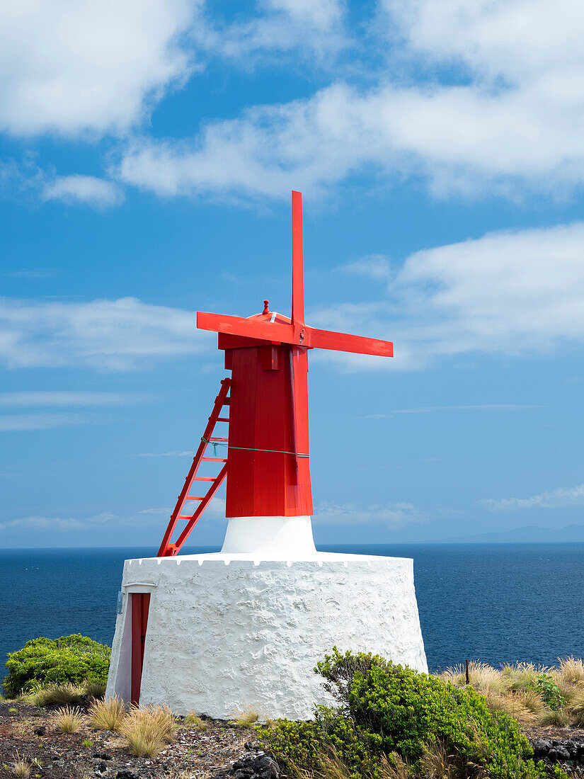 Village in Urzelina, traditional windmills, Urzelina de Urzelina. Sao Jorge Island, Azores, Portugal.