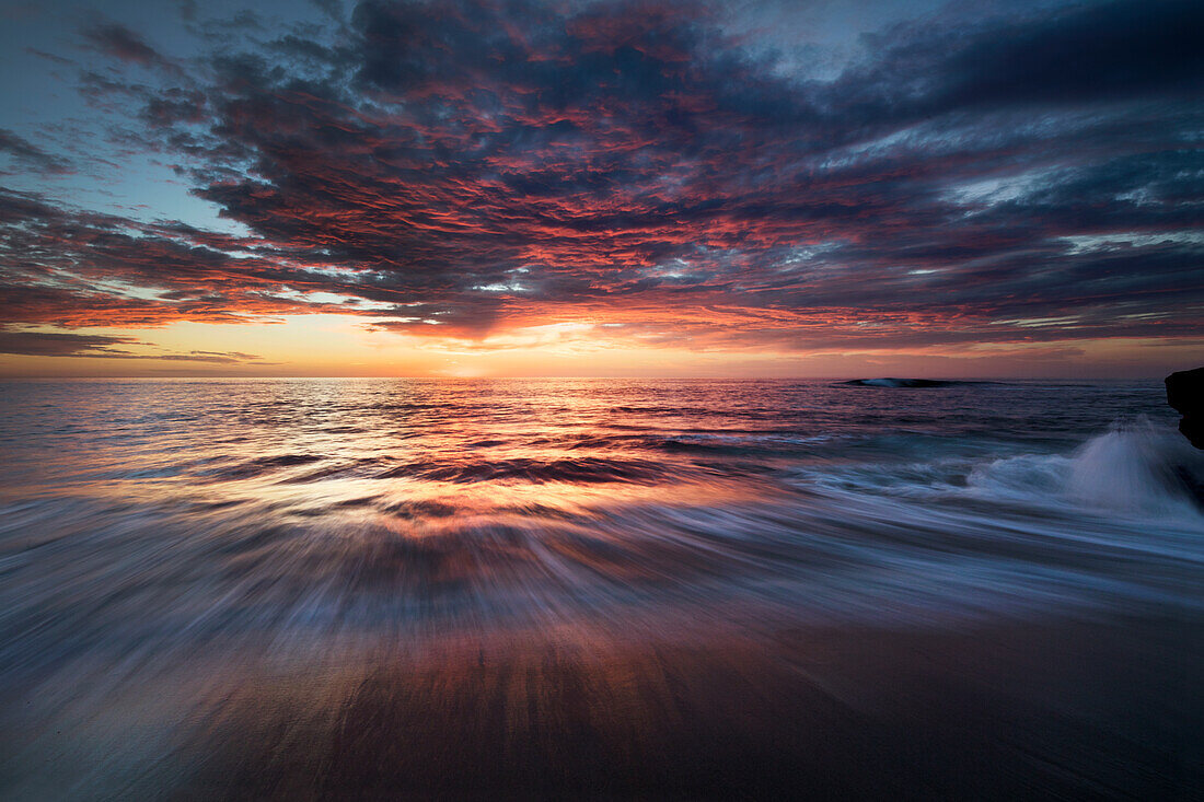 USA, California, La Jolla. Sunset over beach