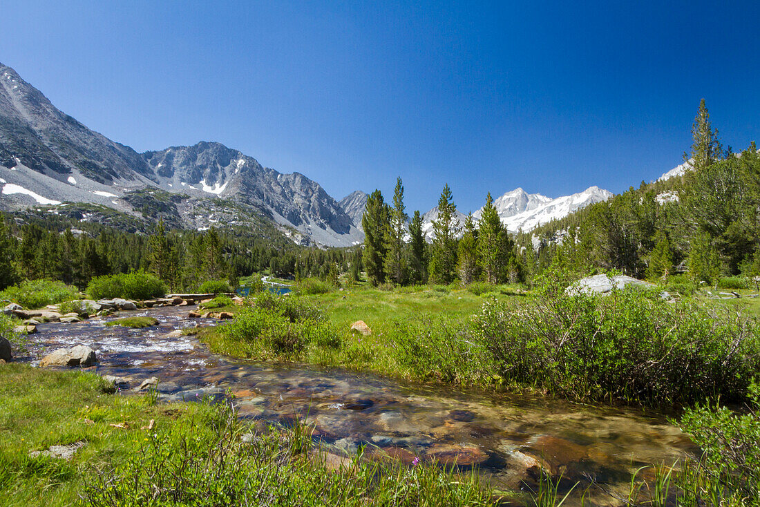 USA, California, Little Lakes Valley. One of several glacial lakes along a stream in the Little Lakes Valley near Bishop and Mammoth Lakes.