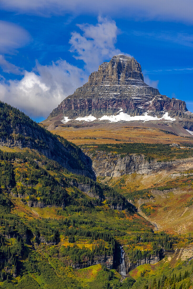 Clements Mountain and Reynolds Creek Falls in autumn, Glacier National Park, Montana, USA