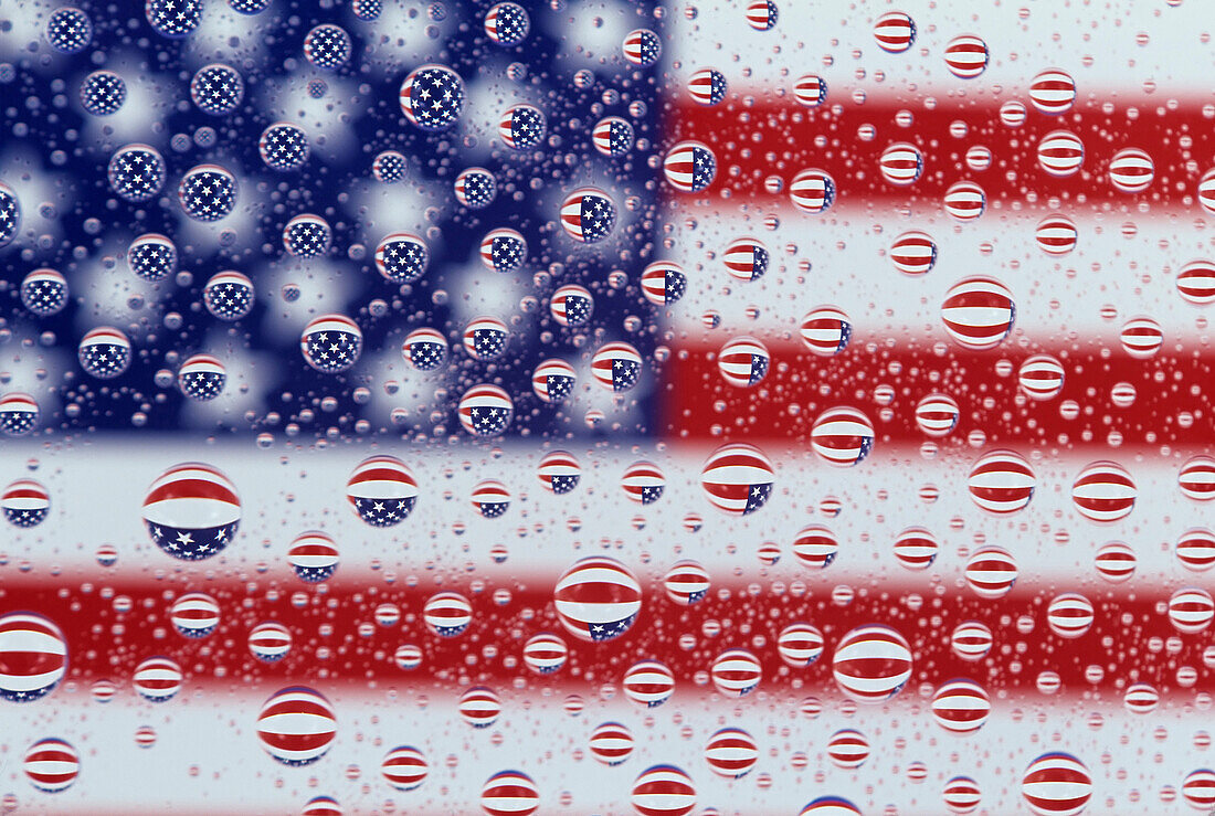 WA, Redmond, American flag; reflected in water drops