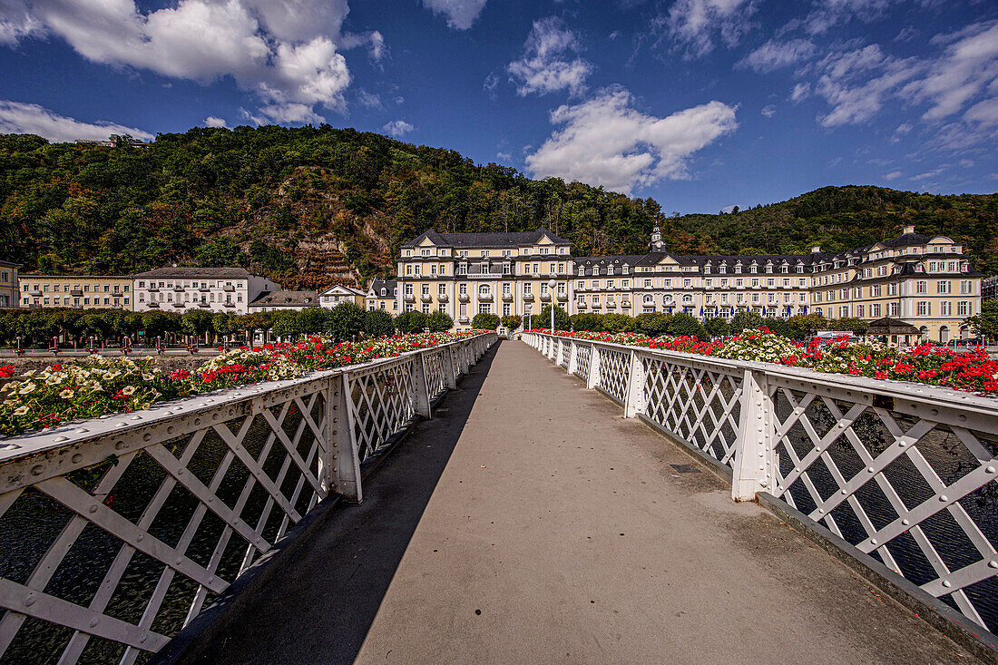 View across the flower-decorated Kurbrücke to the Kurhaus, Bad Ems, Rhineland-Palatinate, Germany