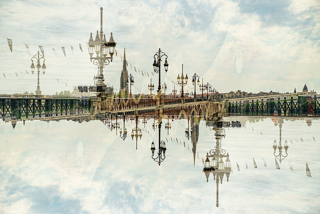 The elegant Pont de Pierre bridge, comissioned by Napoleon Bonaparte, crossing the river Garonne in Bordeaux, Fance.