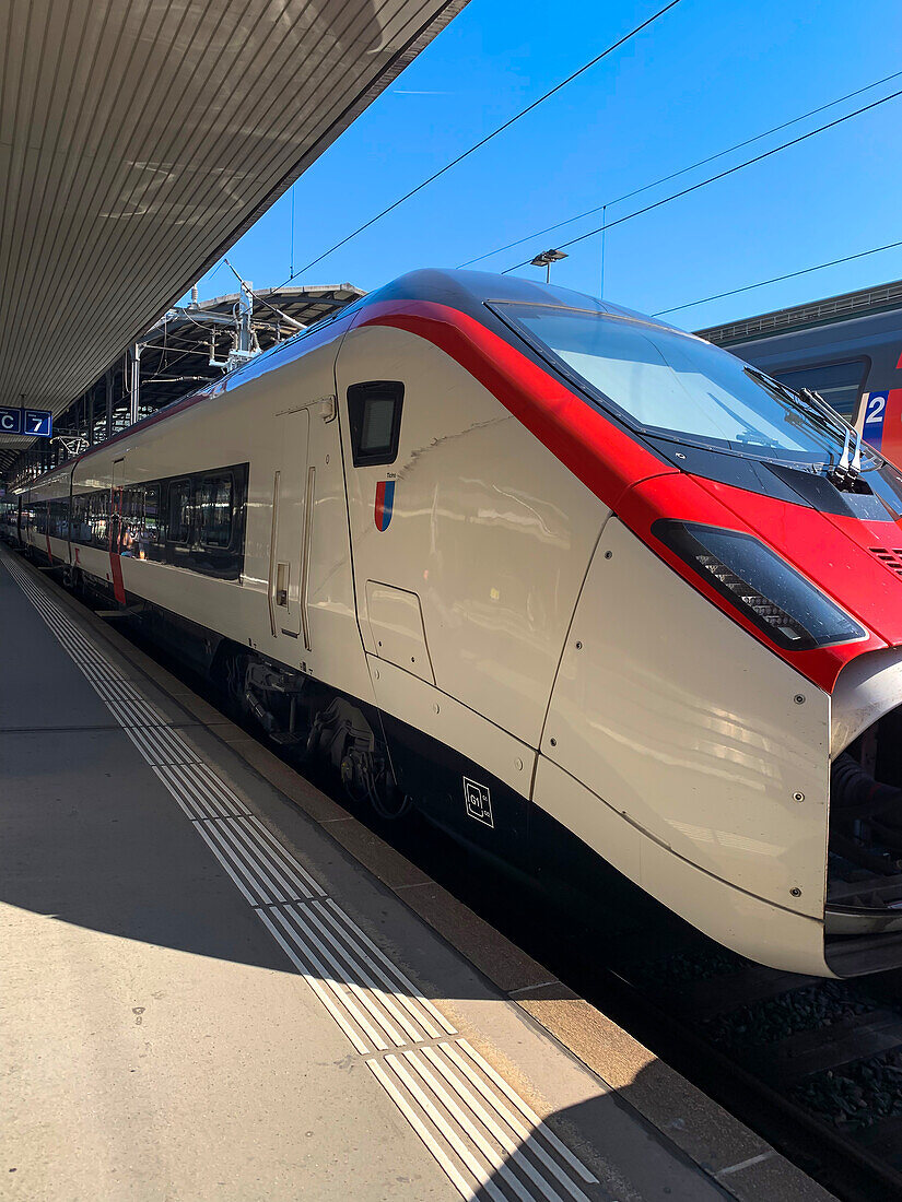 Fast Train in Railroad Station ina Sunny Day in Lucerne, Switzerland.